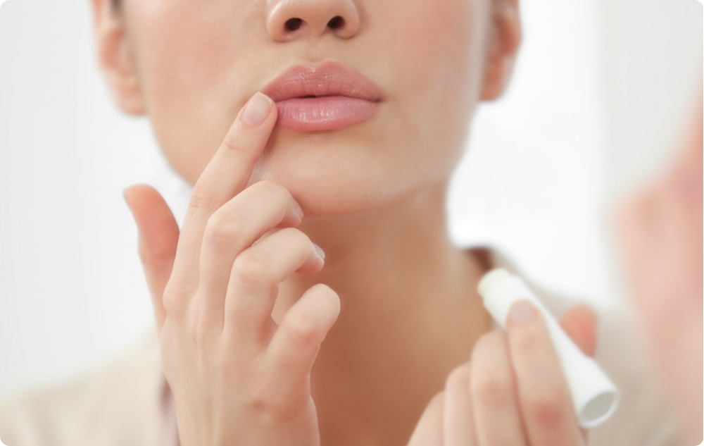 Als olie bij herpes of aften op de lippen